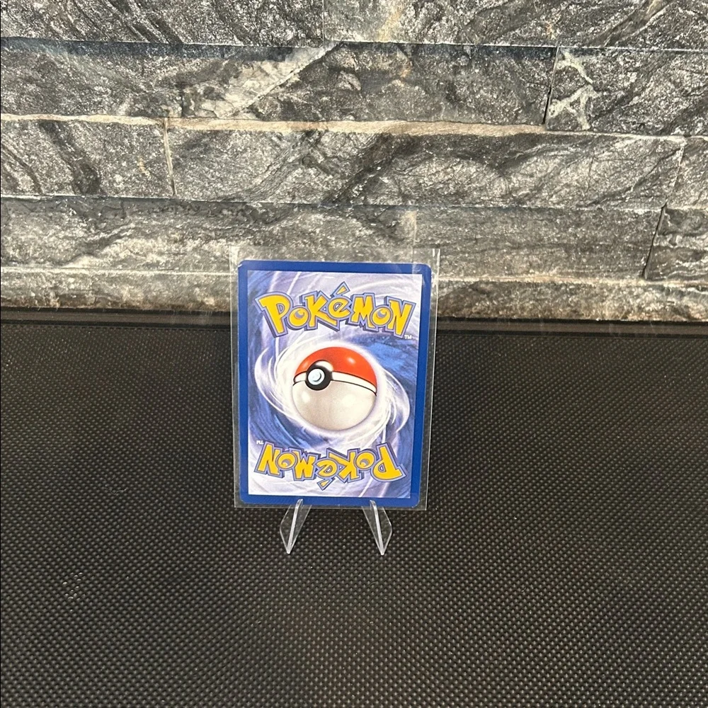 Pokemon Okidogi‎ 057/131 Holo Card from Prismatic Evolutions Set M/NM